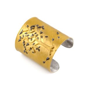 tree-inspired silver and gold diamond bracelet