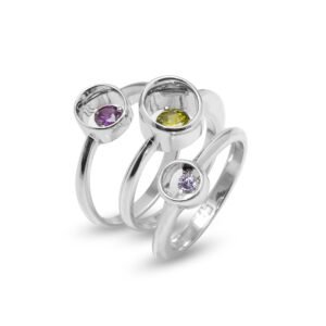 triple silver rings with colorful stones