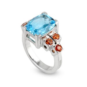 Silver Garnet and Blue Topaz Ring